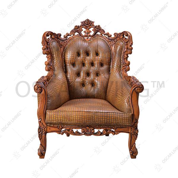 Ornate chair upholstered in rich brown leather, showcasing intricate detailing and elegant design.